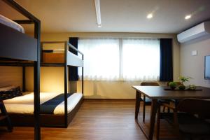 Postel nebo postele na pokoji v ubytování RoNa Hotel