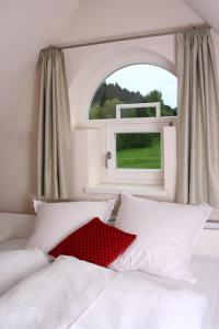 מיטה או מיטות בחדר ב-Haus Berghoff