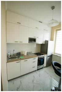 Кухня або міні-кухня у Color 24 Apartament III