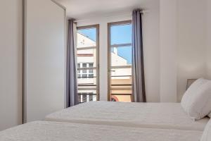 Posteľ alebo postele v izbe v ubytovaní Apartamento Pizarro 2b