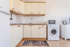 Kuchyňa alebo kuchynka v ubytovaní Apartamento Pizarro 2b