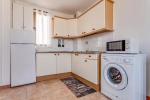 Kuchyňa alebo kuchynka v ubytovaní Apartamento Pizarro 2b