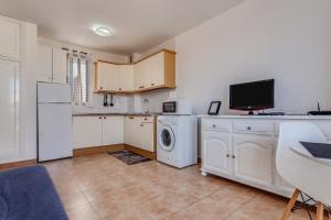 Kuchyňa alebo kuchynka v ubytovaní Apartamento Pizarro 2b