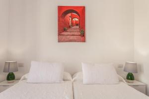 Posteľ alebo postele v izbe v ubytovaní Apartamento Pizarro 2b
