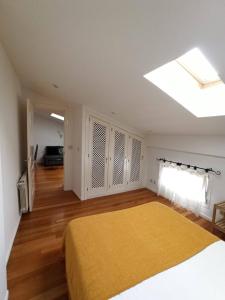 Posteľ alebo postele v izbe v ubytovaní La casa de LA FLORA a 3 minutos de la catedral VUT09187