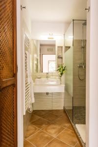 a bathroom with a sink and a mirror at Agroturismo Can Pere Sord in Sant Joan de Labritja