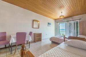 Posteľ alebo postele v izbe v ubytovaní Apartments Kod Cara