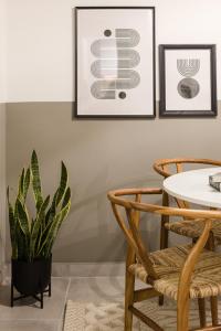 A seating area at Serene 1 BR Apartment in Koukaki by UPSTREET