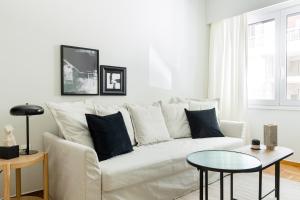 A seating area at Serene 1 BR Apartment in Koukaki by UPSTREET