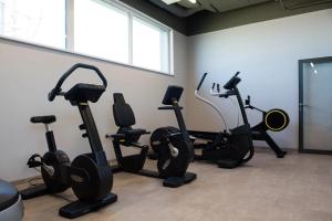 a group of exercise bikes in a room at Hotel Picaro Kopytkowo A1 in Kopytkowo
