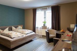 Ein Bett oder Betten in einem Zimmer der Unterkunft Sporthotel Wernigerode