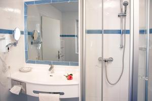 Koupelna v ubytování Bavaria Biohotel