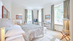 Postel nebo postele na pokoji v ubytování Hotel Ole Liese