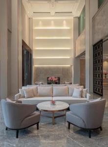 Posezení v ubytování AIHO Hotel Medan