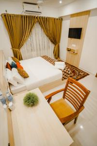 Athirappilly Rainland Resort客房内的一张或多张床位