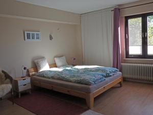 Postel nebo postele na pokoji v ubytování Ferienwohnung am Waldrand, Hitzacker