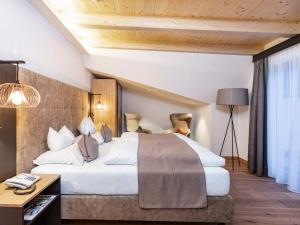 Posteľ alebo postele v izbe v ubytovaní Seiblishof Superior Hotel Ischgl