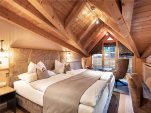 Posteľ alebo postele v izbe v ubytovaní Seiblishof Superior Hotel Ischgl