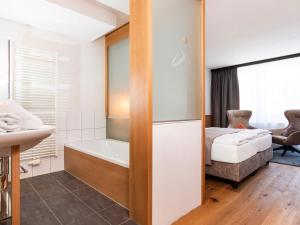 Posteľ alebo postele v izbe v ubytovaní Seiblishof Superior Hotel Ischgl