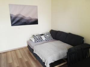 Posteľ alebo postele v izbe v ubytovaní Palace - Belvárosi Apartman Eger