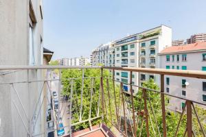 a balcony with a view of buildings at Central Maya Apartment in Milan