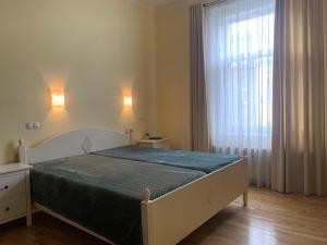 Postel nebo postele na pokoji v ubytování Teplice Central Park