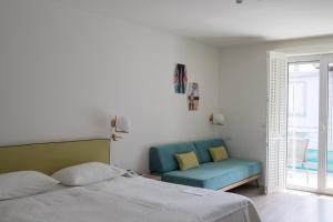Posteľ alebo postele v izbe v ubytovaní Hotel Savoy