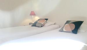 Katil atau katil-katil dalam bilik di Appartement spacieux à 200 m de la plage - Hôtel de l'Europe +3 gambar