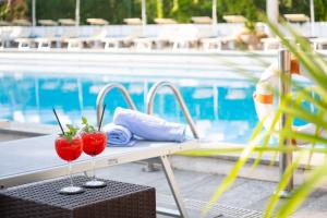 Bazén v ubytování Hotel Al Cigno nebo v jeho okolí