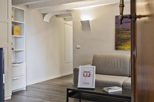 Część wypoczynkowa w obiekcie Boutique Apartment in Via Roma by Wonderful Italy