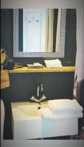 Ett badrum på City Apartments Gorinchem