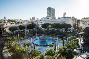 an aerial view of a city with a fountain at Cinema Hotel - an Atlas Boutique Hotel in Tel Aviv