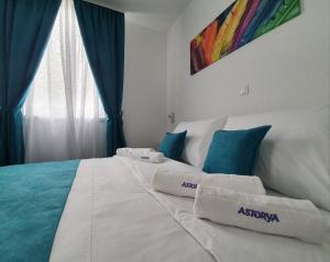 Postel nebo postele na pokoji v ubytování Hotel Wellness&Spa Astorya Banja Luka