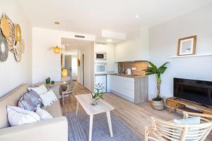 Kuchyň nebo kuchyňský kout v ubytování Huelin Suites