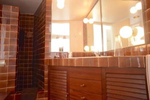 a bathroom with a sink and a mirror at Es Forn - Cadaqués in Cadaqués