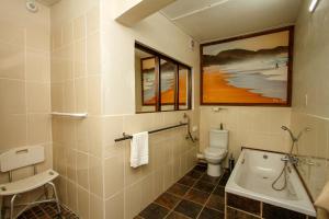 Ένα μπάνιο στο Umlilo Guest House