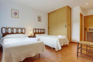 Postel nebo postele na pokoji v ubytování Villa MAGDALENA + 6 fotografií