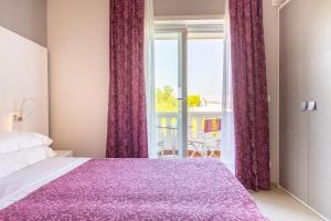 Postel nebo postele na pokoji v ubytování Hotel Al Cigno