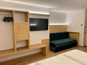 Posteľ alebo postele v izbe v ubytovaní Garni Hotel and Apartments Wildbach
