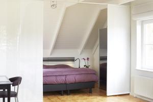Ένα ή περισσότερα κρεβάτια σε δωμάτιο στο B2B-flats