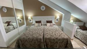 A bed or beds in a room at PARQUE SANTIAGO 1 LUXURY APARTAMENT (Playa de las Américas)