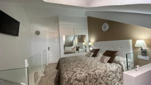 A bed or beds in a room at PARQUE SANTIAGO 1 LUXURY APARTAMENT (Playa de las Américas) Még 37 kép