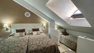 A bed or beds in a room at PARQUE SANTIAGO 1 LUXURY APARTAMENT (Playa de las Américas)