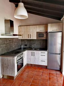 Kuchyň nebo kuchyňský kout v ubytování Vivienda Casa Abuela