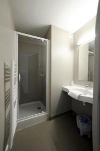 Vonios kambarys apgyvendinimo įstaigoje Actif Residence