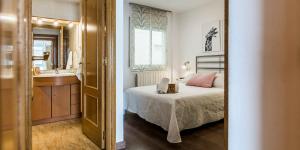 Ένα ή περισσότερα κρεβάτια σε δωμάτιο στο Apartamento Ainsa