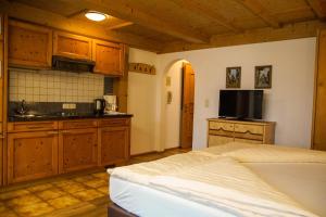 Kuchyň nebo kuchyňský kout v ubytování Appartement Winkler