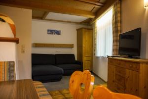 TV a/nebo společenská místnost v ubytování Appartement Winkler