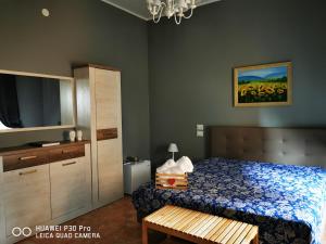 Postel nebo postele na pokoji v ubytování L'ARENA ROOM