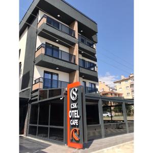 a building with a sign in front of it at CSK OTEL in Tekirdag